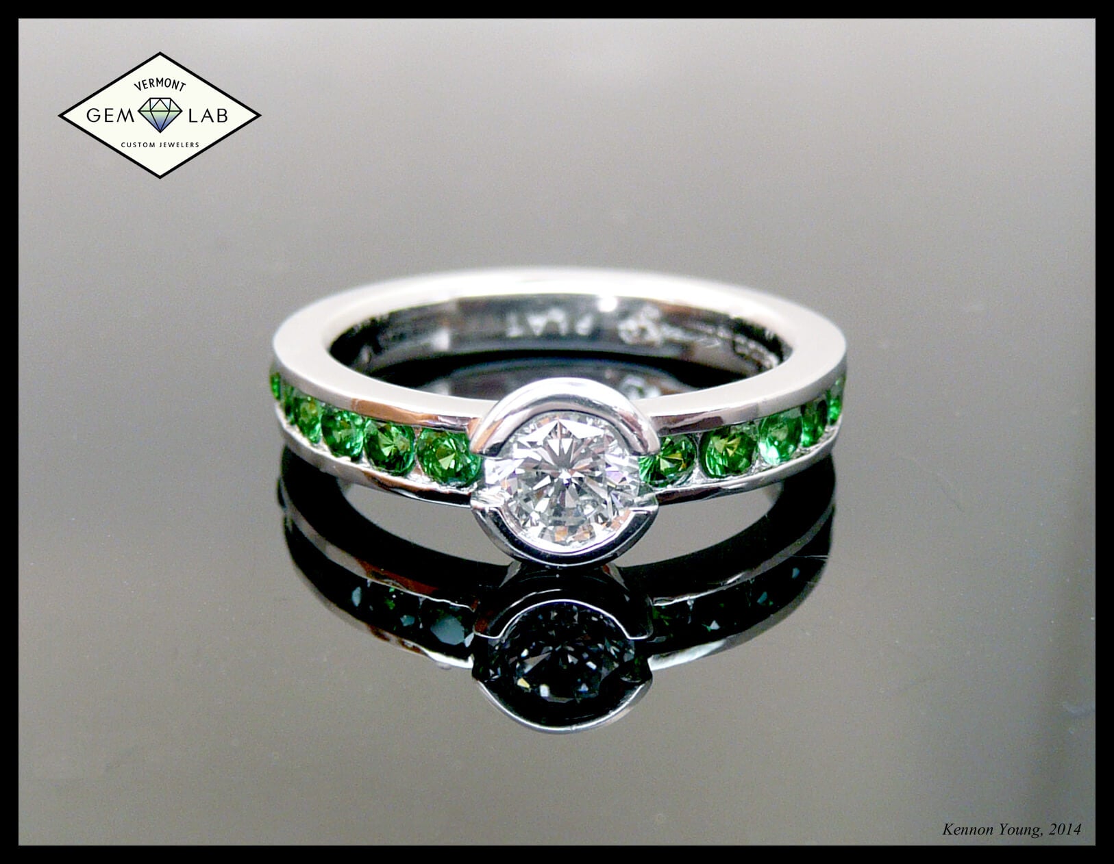 Round diamond half bezel set channel set green garnet platinum custom Engagement Ring Vermont